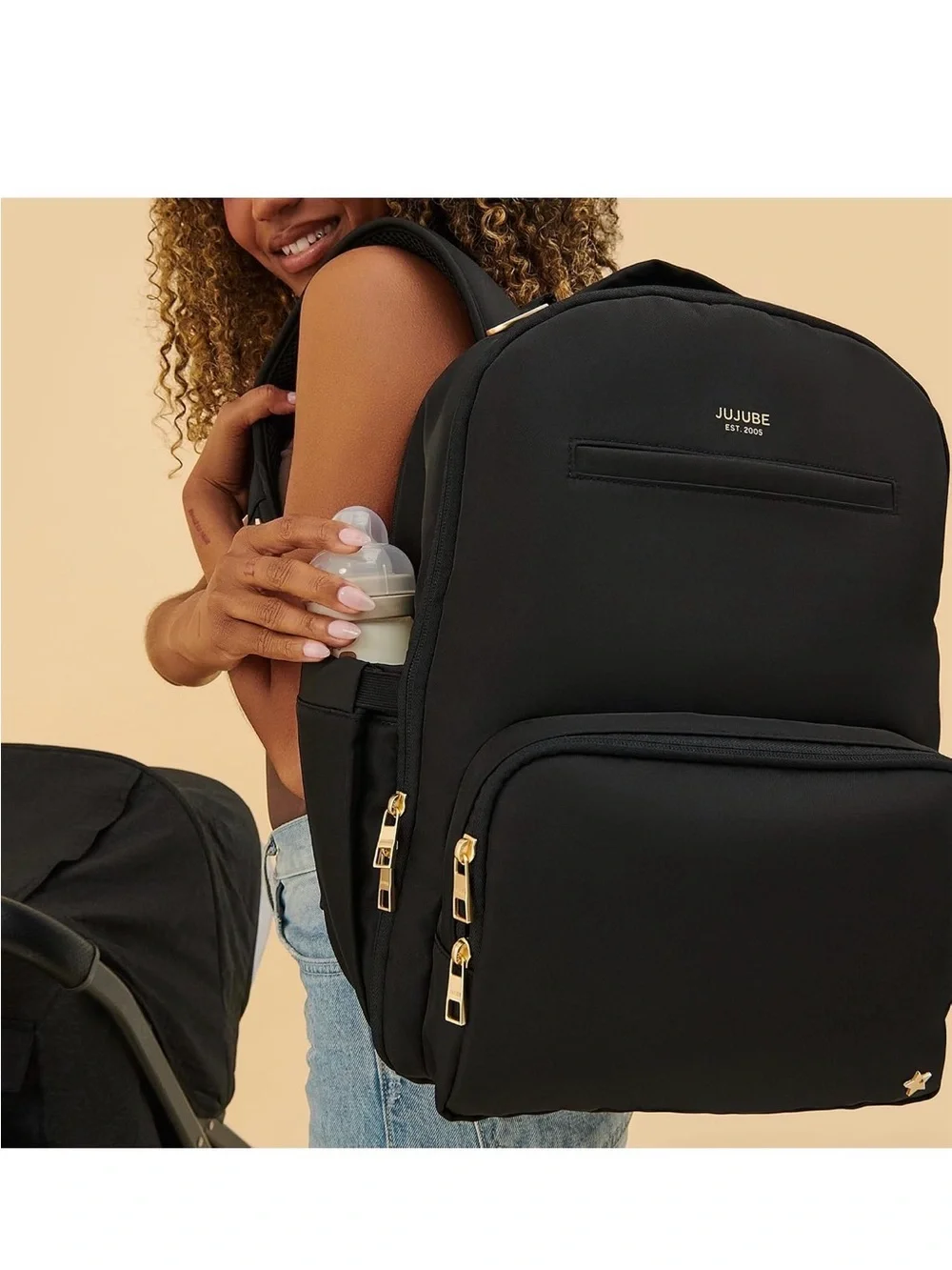 JuJuBe Black Backpack with Gold Hardware, and portable changing pad included